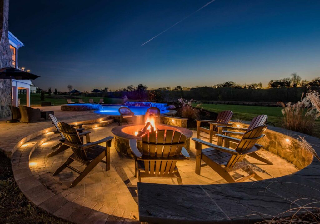 pool and fire pit in backyard